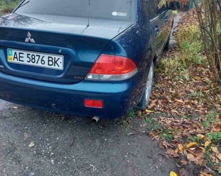 Синий Мицубиси Лансер, объемом двигателя 1.6 л и пробегом 87 тыс. км за 7000 $, фото 1 на Automoto.ua