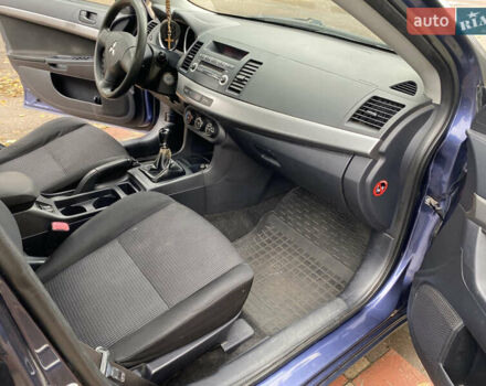 Синій Міцубісі Lancer, об'ємом двигуна 1.5 л та пробігом 271 тис. км за 4900 $, фото 14 на Automoto.ua