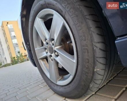 Синій Міцубісі Lancer, об'ємом двигуна 2 л та пробігом 234 тис. км за 6700 $, фото 4 на Automoto.ua