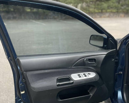 Синий Мицубиси Лансер, объемом двигателя 1.6 л и пробегом 185 тыс. км за 4950 $, фото 17 на Automoto.ua