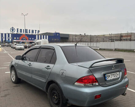 Синий Мицубиси Лансер, объемом двигателя 1.6 л и пробегом 238 тыс. км за 3500 $, фото 5 на Automoto.ua