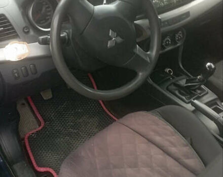 Синий Мицубиси Лансер, объемом двигателя 1.47 л и пробегом 172 тыс. км за 6350 $, фото 4 на Automoto.ua