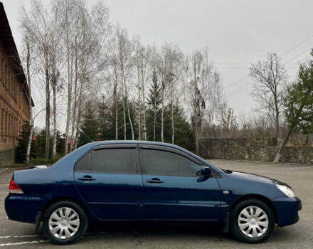 Синий Мицубиси Лансер, объемом двигателя 1.6 л и пробегом 184 тыс. км за 4950 $, фото 9 на Automoto.ua