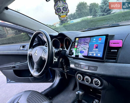Синій Міцубісі Lancer, об'ємом двигуна 2 л та пробігом 282 тис. км за 6700 $, фото 26 на Automoto.ua