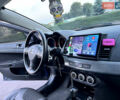 Синій Міцубісі Lancer, об'ємом двигуна 2 л та пробігом 282 тис. км за 6700 $, фото 26 на Automoto.ua