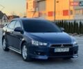 Синий Мицубиси Лансер, объемом двигателя 2 л и пробегом 230 тыс. км за 6400 $, фото 1 на Automoto.ua