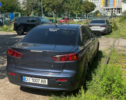 Синий Мицубиси Лансер, объемом двигателя 1.47 л и пробегом 250 тыс. км за 4500 $, фото 4 на Automoto.ua