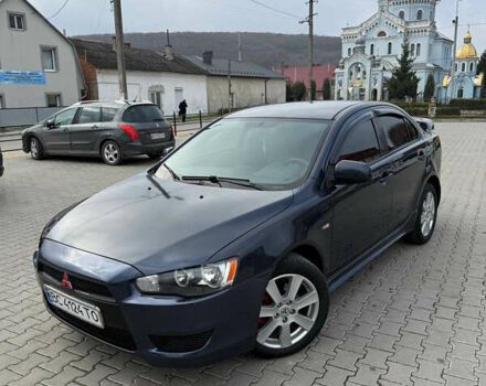 Синий Мицубиси Лансер, объемом двигателя 2 л и пробегом 326 тыс. км за 5650 $, фото 1 на Automoto.ua