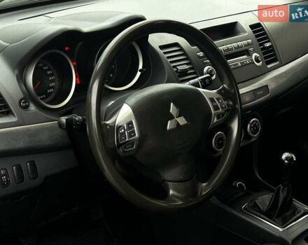 Синій Міцубісі Lancer, об'ємом двигуна 2 л та пробігом 222 тис. км за 5999 $, фото 8 на Automoto.ua