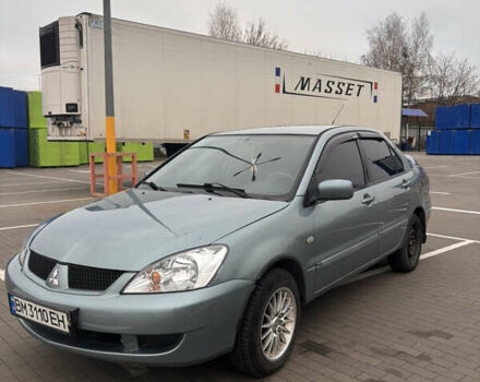 Синий Мицубиси Лансер, объемом двигателя 1.6 л и пробегом 238 тыс. км за 3500 $, фото 1 на Automoto.ua