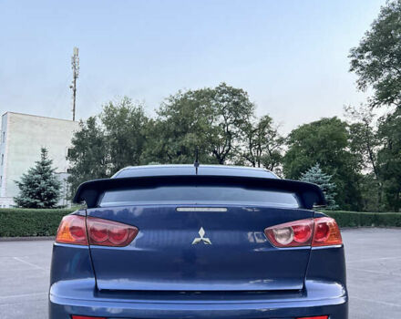 Синій Міцубісі Lancer, об'ємом двигуна 2 л та пробігом 282 тис. км за 6700 $, фото 13 на Automoto.ua