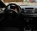 Синій Міцубісі Lancer, об'ємом двигуна 2 л та пробігом 189 тис. км за 7350 $, фото 17 на Automoto.ua