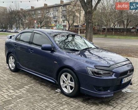 Синій Міцубісі Lancer, об'ємом двигуна 2 л та пробігом 210 тис. км за 6800 $, фото 6 на Automoto.ua