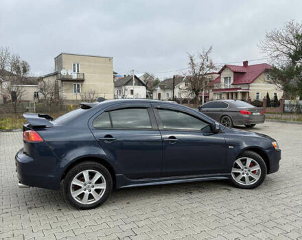 Синий Мицубиси Лансер, объемом двигателя 2 л и пробегом 326 тыс. км за 5650 $, фото 4 на Automoto.ua