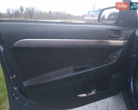 Синий Мицубиси Лансер, объемом двигателя 1.5 л и пробегом 260 тыс. км за 5000 $, фото 13 на Automoto.ua