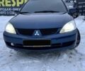Синій Міцубісі Lancer, об'ємом двигуна 1.58 л та пробігом 233 тис. км за 4150 $, фото 1 на Automoto.ua