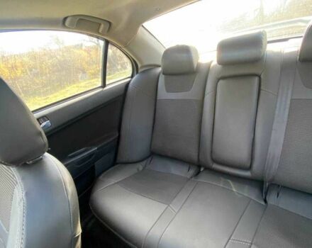 Мицубиси Лансер 2007 в Днепре (Днепропетровске) на Automoto.ua Синий Мицубиси Лансер, объемом двигателя 2 л и пробегом 208 тыс. км за 6400 $, фото 7 на Automoto.ua