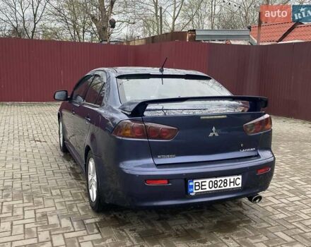 Синій Міцубісі Lancer, об'ємом двигуна 2 л та пробігом 210 тис. км за 6800 $, фото 12 на Automoto.ua