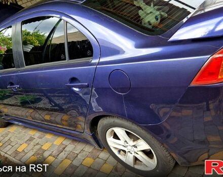 Синій Міцубісі Lancer, об'ємом двигуна 2 л та пробігом 248 тис. км за 5000 $, фото 7 на Automoto.ua