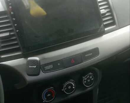 Синий Мицубиси Лансер, объемом двигателя 1.47 л и пробегом 172 тыс. км за 6350 $, фото 6 на Automoto.ua