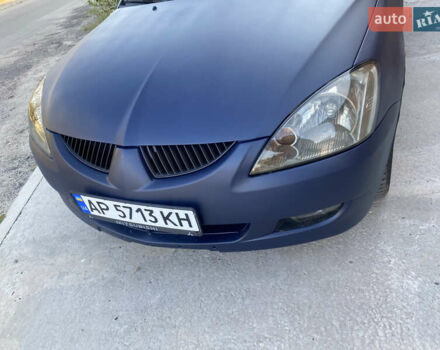 Синий Мицубиси Лансер, объемом двигателя 2 л и пробегом 100 тыс. км за 4999 $, фото 7 на Automoto.ua