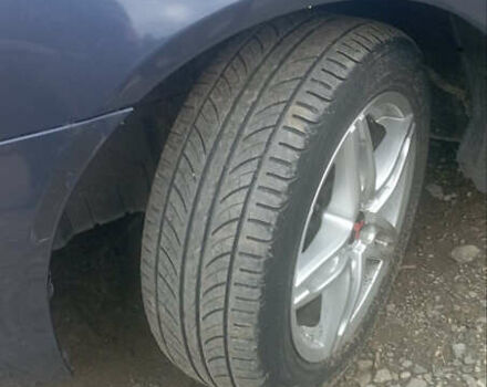 Синий Мицубиси Лансер, объемом двигателя 1.47 л и пробегом 172 тыс. км за 6350 $, фото 7 на Automoto.ua