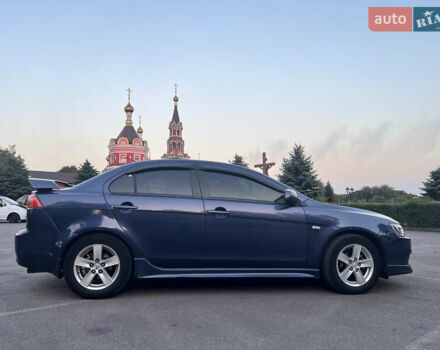 Синій Міцубісі Lancer, об'ємом двигуна 2 л та пробігом 282 тис. км за 6700 $, фото 9 на Automoto.ua