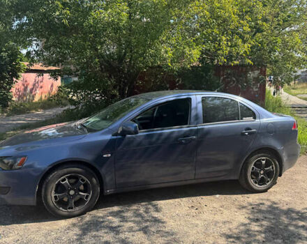 Синий Мицубиси Лансер, объемом двигателя 1.47 л и пробегом 250 тыс. км за 4500 $, фото 7 на Automoto.ua