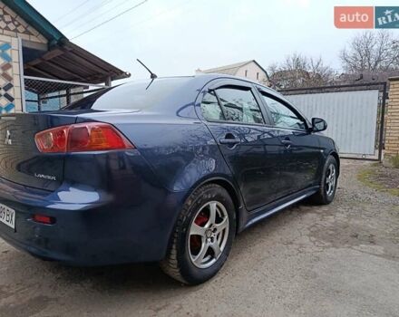 Синий Мицубиси Лансер, объемом двигателя 1.5 л и пробегом 211 тыс. км за 5222 $, фото 7 на Automoto.ua