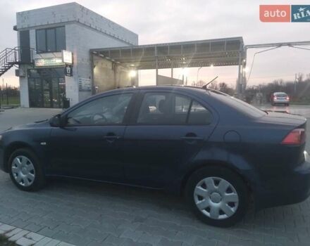 Синий Мицубиси Лансер, объемом двигателя 1.5 л и пробегом 260 тыс. км за 5000 $, фото 20 на Automoto.ua