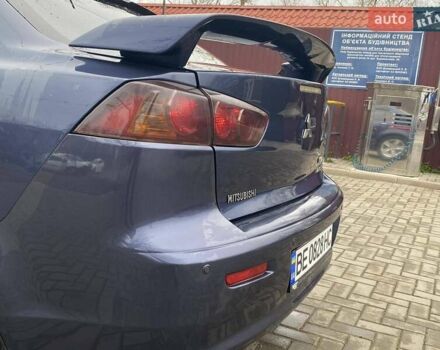 Синій Міцубісі Lancer, об'ємом двигуна 2 л та пробігом 210 тис. км за 6800 $, фото 31 на Automoto.ua