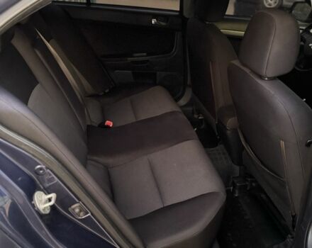 Синій Міцубісі Lancer, об'ємом двигуна 2 л та пробігом 189 тис. км за 7350 $, фото 16 на Automoto.ua