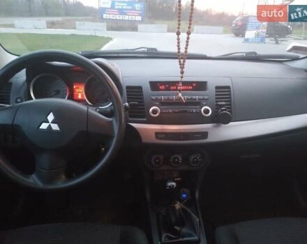 Синий Мицубиси Лансер, объемом двигателя 1.5 л и пробегом 260 тыс. км за 5000 $, фото 18 на Automoto.ua