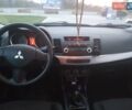 Синий Мицубиси Лансер, объемом двигателя 1.5 л и пробегом 260 тыс. км за 5000 $, фото 18 на Automoto.ua