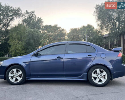 Синій Міцубісі Lancer, об'ємом двигуна 2 л та пробігом 282 тис. км за 6700 $, фото 10 на Automoto.ua