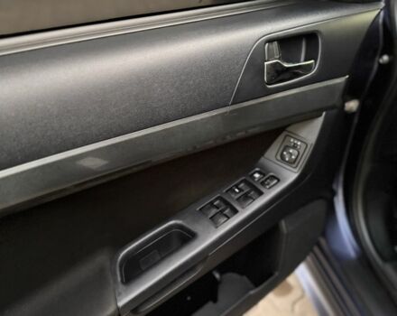 Синій Міцубісі Lancer, об'ємом двигуна 2 л та пробігом 189 тис. км за 7350 $, фото 9 на Automoto.ua