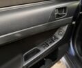 Синій Міцубісі Lancer, об'ємом двигуна 2 л та пробігом 189 тис. км за 7350 $, фото 9 на Automoto.ua