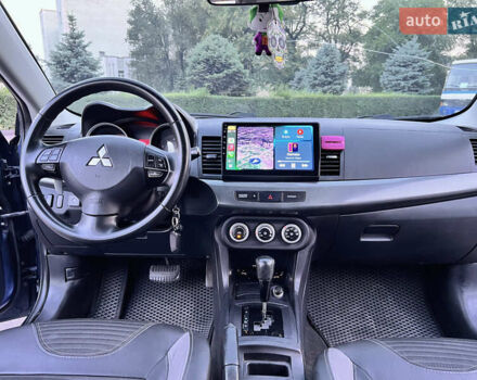 Синій Міцубісі Lancer, об'ємом двигуна 2 л та пробігом 282 тис. км за 6700 $, фото 24 на Automoto.ua