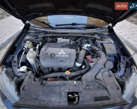 Синій Міцубісі Lancer, об'ємом двигуна 2 л та пробігом 234 тис. км за 6700 $, фото 21 на Automoto.ua