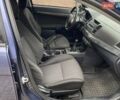 Синій Міцубісі Lancer, об'ємом двигуна 2 л та пробігом 210 тис. км за 6800 $, фото 22 на Automoto.ua