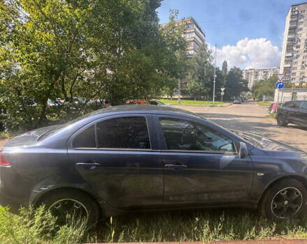 Синий Мицубиси Лансер, объемом двигателя 1.47 л и пробегом 250 тыс. км за 4500 $, фото 5 на Automoto.ua
