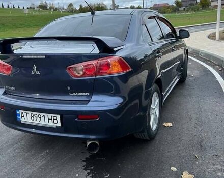 Синій Міцубісі Lancer, об'ємом двигуна 2 л та пробігом 190 тис. км за 6700 $, фото 4 на Automoto.ua