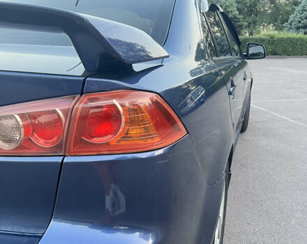 Синій Міцубісі Lancer, об'ємом двигуна 2 л та пробігом 282 тис. км за 6700 $, фото 12 на Automoto.ua