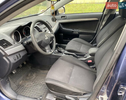 Синій Міцубісі Lancer, об'ємом двигуна 1.5 л та пробігом 271 тис. км за 4900 $, фото 8 на Automoto.ua