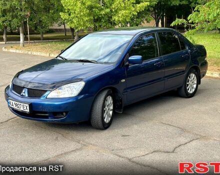 Синий Мицубиси Лансер, объемом двигателя 1.6 л и пробегом 202 тыс. км за 4900 $, фото 1 на Automoto.ua