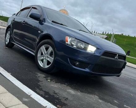 Синій Міцубісі Lancer, об'ємом двигуна 2 л та пробігом 190 тис. км за 6700 $, фото 3 на Automoto.ua