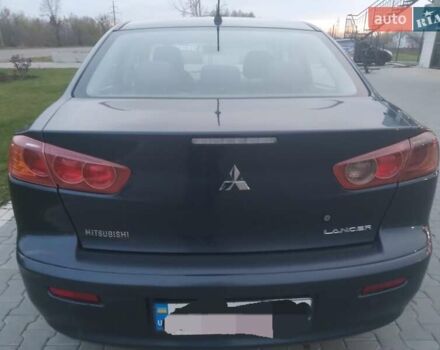 Синий Мицубиси Лансер, объемом двигателя 1.5 л и пробегом 260 тыс. км за 5000 $, фото 4 на Automoto.ua