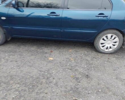 Синий Мицубиси Лансер, объемом двигателя 1.6 л и пробегом 87 тыс. км за 7000 $, фото 2 на Automoto.ua