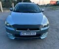 Синий Мицубиси Лансер, объемом двигателя 2 л и пробегом 210 тыс. км за 6005 $, фото 1 на Automoto.ua