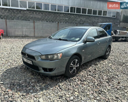 Синій Міцубісі Lancer, об'ємом двигуна 1.5 л та пробігом 210 тис. км за 6250 $, фото 5 на Automoto.ua